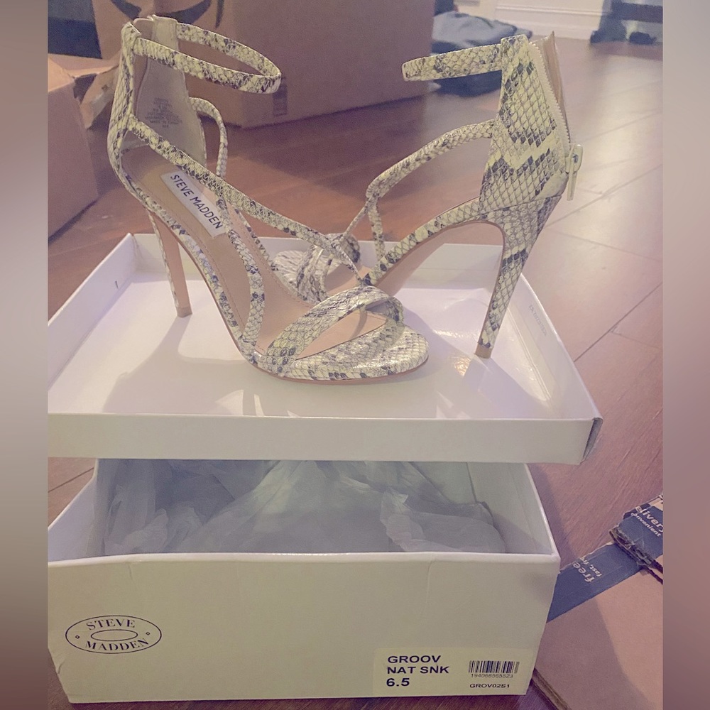 Steve Madden size 6.5 hot snakeskin stiletto heels, in brand new condition.
